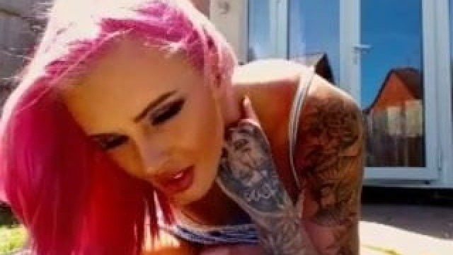 British girl shows of her tats and tits