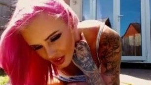 British girl shows of her tats and tits