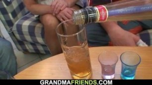 Boozed blonde grandma takes two big cocks