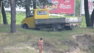 Ola walking alone naked on a public beach (voyeur version)