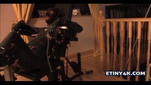 BDSM femdom masochism in latex with a blonde